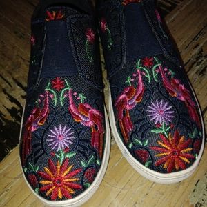 Embroidered slip on tennis shoes